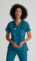Load image into Gallery viewer, Bree One Pocket Tuck-In Style Top by Grey&#39;s Anatomy Spandex Stretch/ V-Neck One Pocket Top - Scrub Hub
